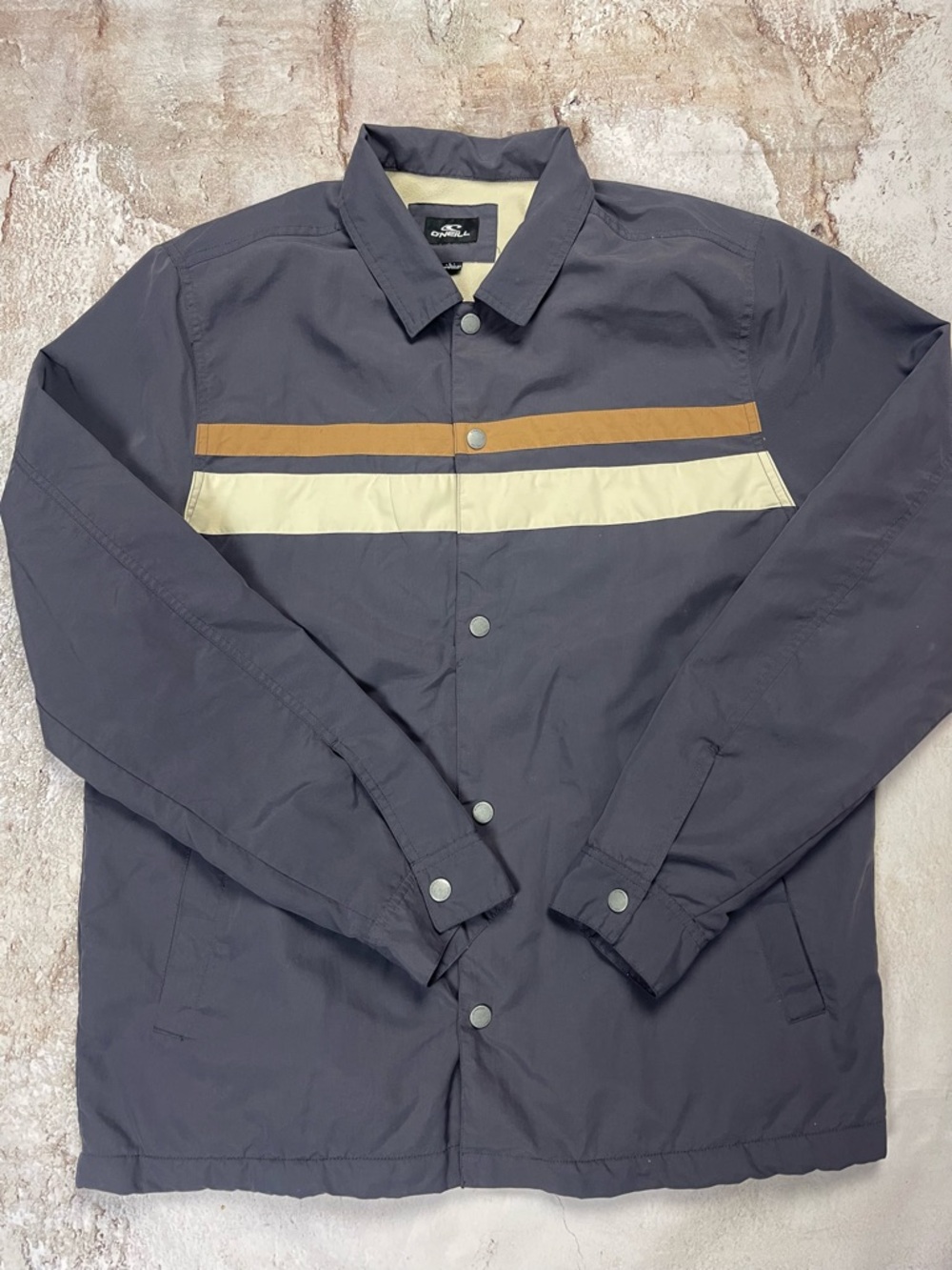 O'Neill Navy Windbreaker with Tan and Cream Stripes